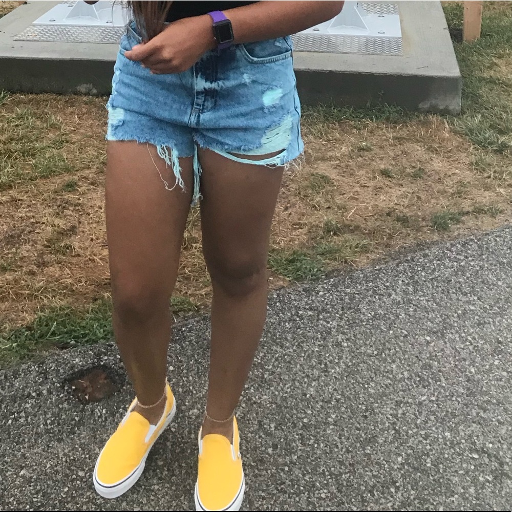 Yellow slip on vans